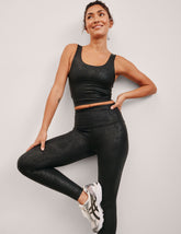 black viper print high-waisted midi leggings.